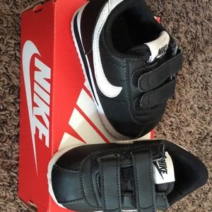 Size 4c Black and white Nike Cortez